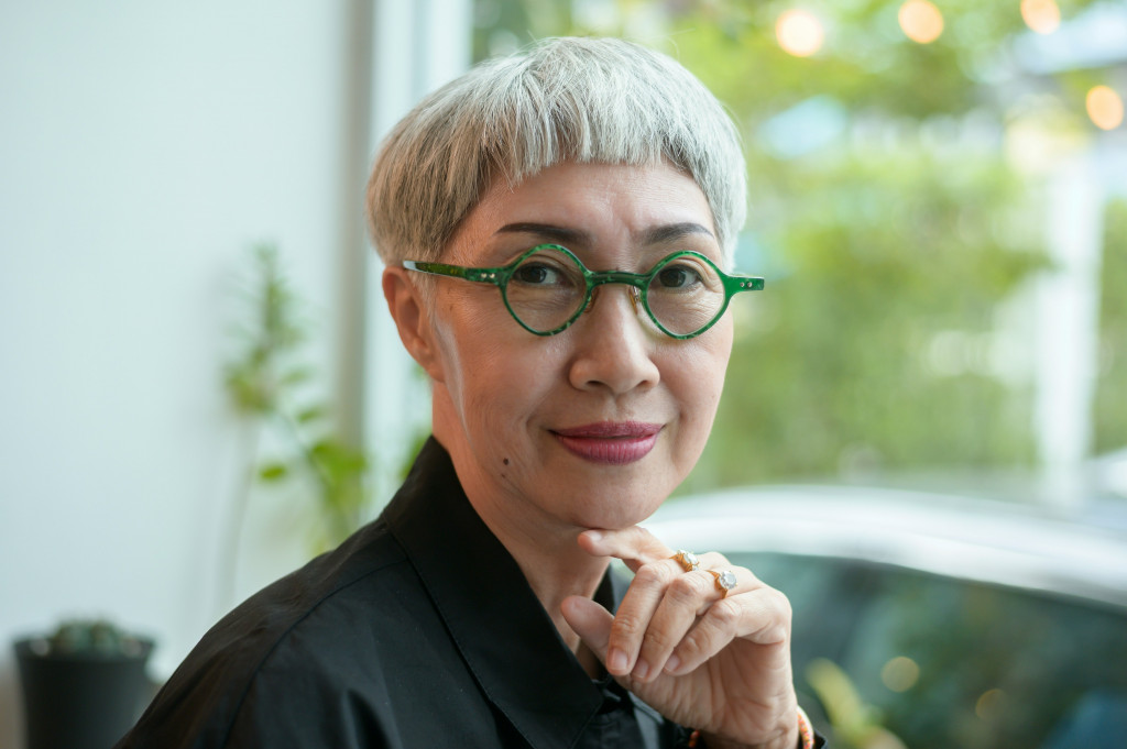 neurodivergent mature woman with glasses